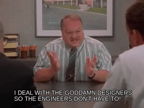 Tom from Office Space animatedly telling the Bobs: I deal with the goddamn designers so the engineers don't have to!
